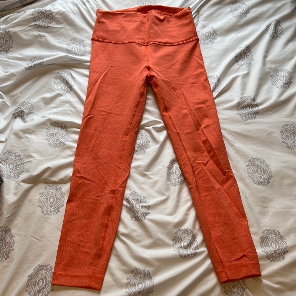 wunder train 25” cracked coral/orange color